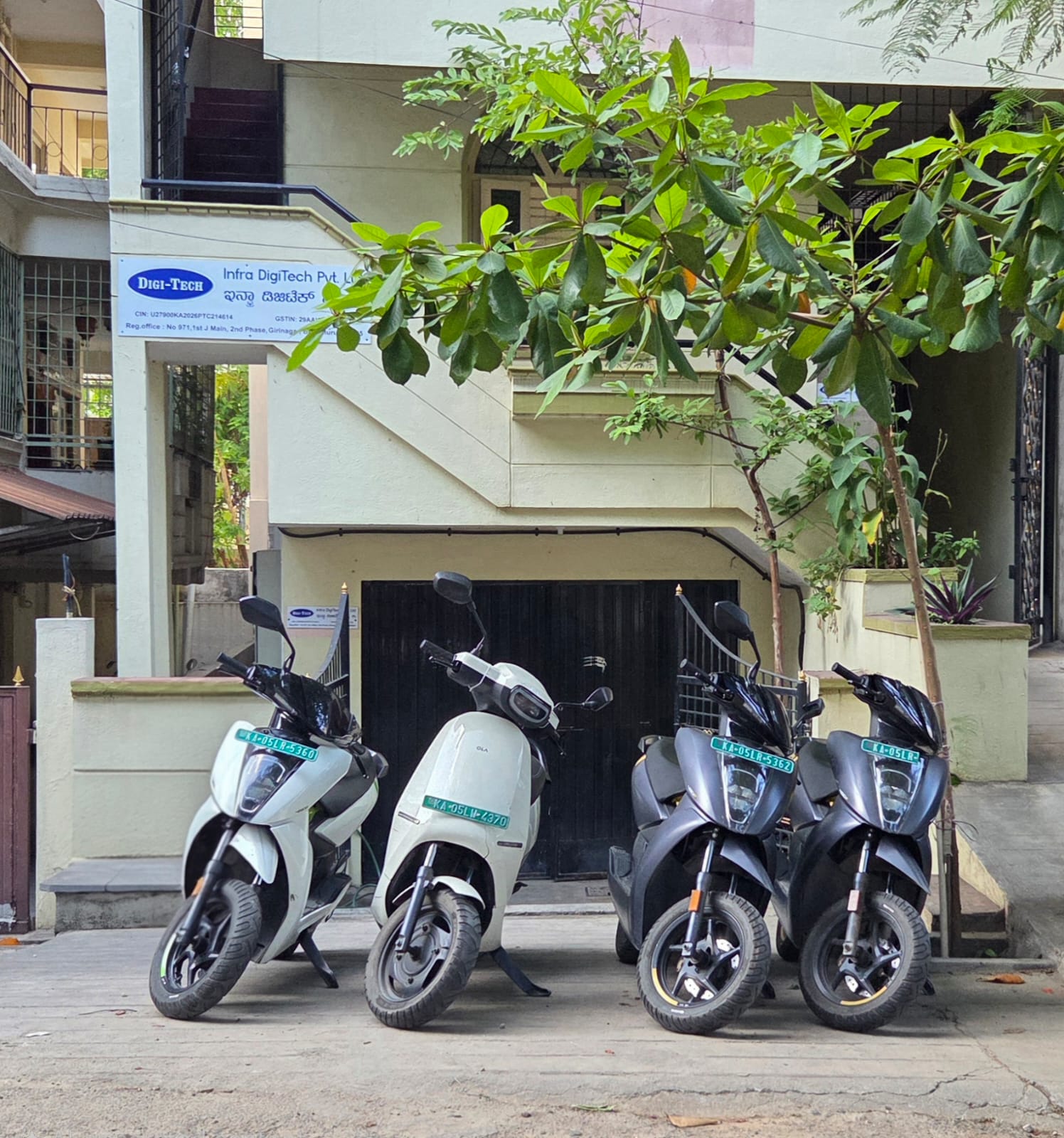Infra DigiTech electric vehicle fleet — Tata Nexon EV, Ola and Ather